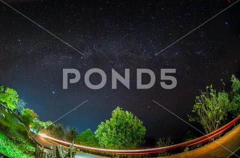 Milky way over Huai Nam Dang National Park in Chiang Mai, North of Thailand. Stock Photos