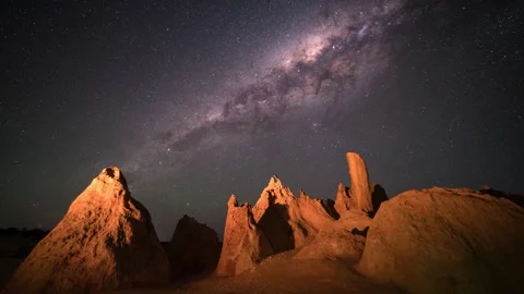 Milky way over The Pinnacles in Western Australia 4K HQ video sliding motion Stock Footage 297552070