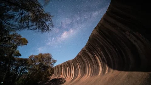 Milky way rising Wave rock, Hyden Western Australia 4K Video timelapse 2 Stock Footage 297583340
