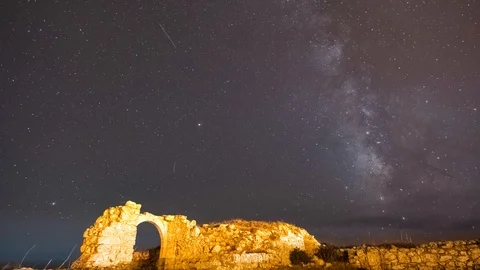 Milky way time lapse over the ancien ruin door Stock Footage 96886900