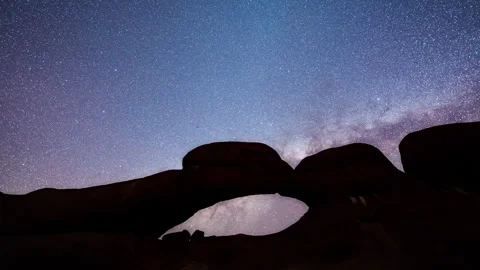 Milky Way Timelapse Over Natural Rock Arch at Spitzkoppe, Namibia Stock Footage 319965239