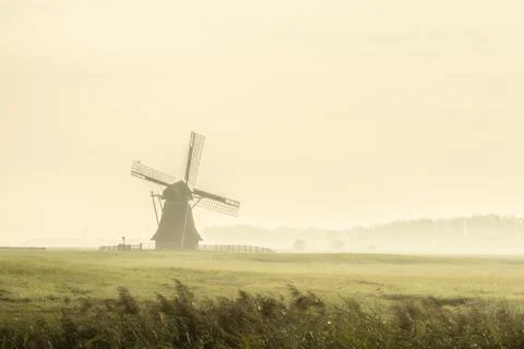 Mill in the fog Stock Photos