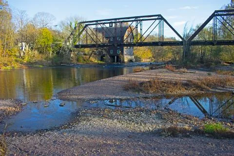 Mill House Behind Abandoned Railroad Trestle Stock-Fotos