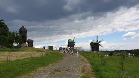 The mill is old. Road to the mill. Stock Photos