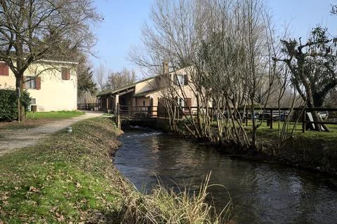 Mill on a river Stock Photos