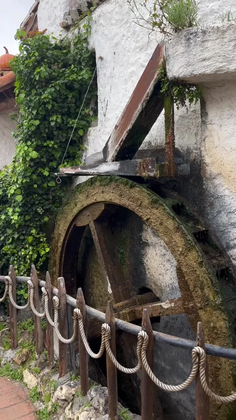 Mill, the wheel turns under the flow of water Stock Footage 303922106