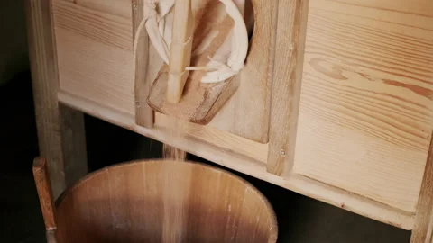 Milled grain dropping into a bin Stock Footage 130336533