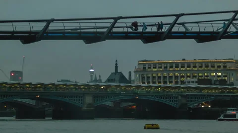 Millenium Bridge in cloudy weather, after sunset, Blackfriars Bridge in the back Stock Footage 44487890