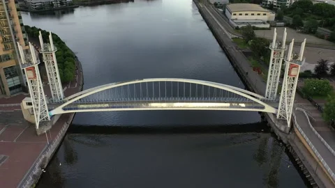 Millenium Bridge Gateshead Newcastle River Tyne aerial Stock Footage 160193884