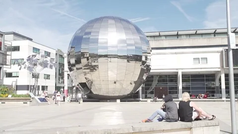 Millenium square bristol pan sunny people slow mo Stock Footage 69773117