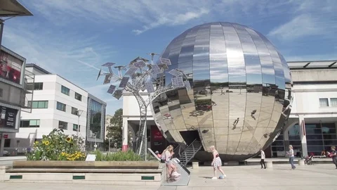 Millenium square bristol sunny slow mo people walking Stock Footage 69773541