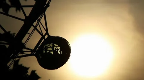 Millenium Wheel against setting sun Stock Footage 8657754