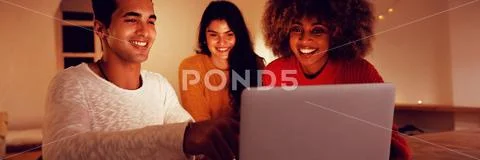 Millennial adult friends socialising together at home Stock Photos