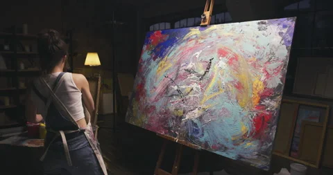 Millennial artist draw with hands with large drops of paint on canvas. Concept Stock Footage 264321657