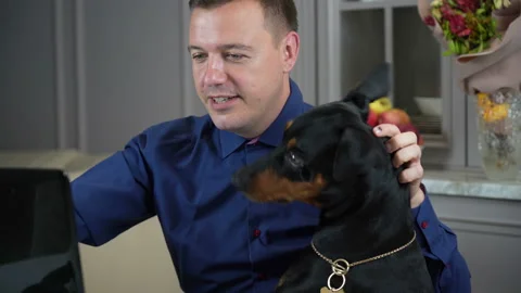 Millennial freelancer man is working from home with his computer in office and Stock Footage 168961973