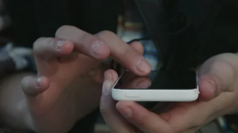 Millennial Girl casually using her smartphone outside Видео 59840561