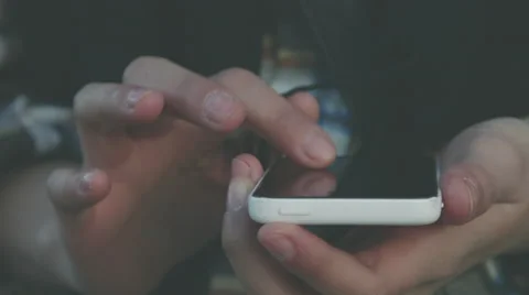 Millennial Girl casually using her smartphone outside Video stock 59840684