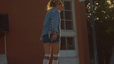Millennial Girl Performing Elements on Quad Rollers Outdoor 库存影片 246477810