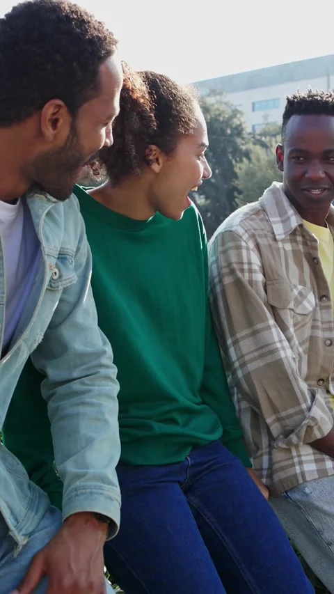 Millennial group of diverse young student friends laughing outdoors. Stock Footage 271097156