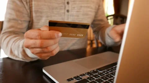 Millennial guy using a credit card for online shopping Happy concept of Stock Footage 265931118