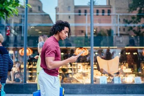 Millennial hipster guy with digital tablet messaging Stock Photos