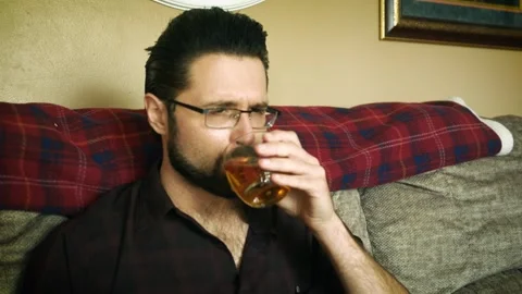 Millennial Man Drinks and is Depressed Stock Footage 319504379