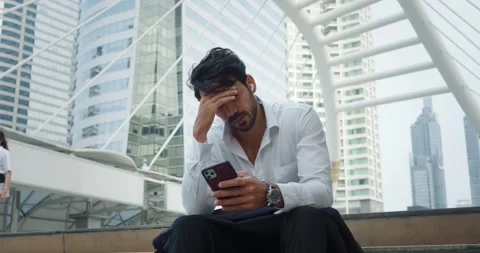 Millennial man face stressed frustration stress burdens carries. Middle eastern Stock Footage 312500267