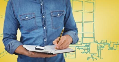 Millennial man mid section writing against yellow and blue hand drawn office Stock Photos