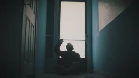 Millennial Man Sitting in Darkness Stock Footage 199015398