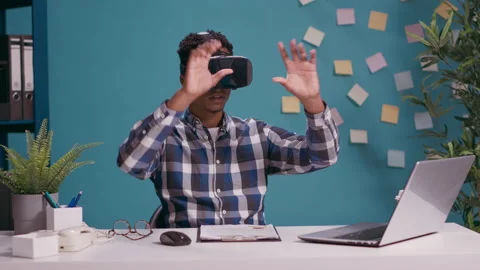 Millennial man using vr glasses with 3d visual simulation Stock Footage 171134503