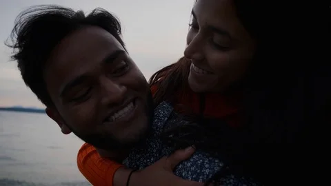 Millennial middle eastern couple looking at one another Stock Footage 111977040