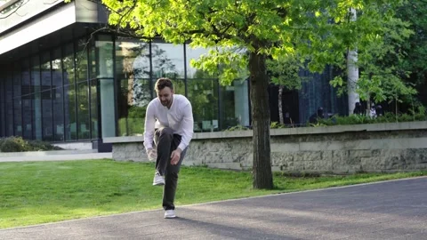 Millennial professional businessman Actively Dancing close to business center.  Stock Footage 244245044