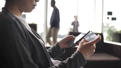 Millennial shopper paying on website ordering delivery mobile phone smartphon Stock Footage 265928751