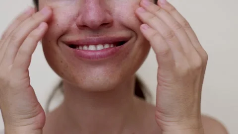 Millennial woman doing face procedures,applying under eye patches Stock-Footage 242990339