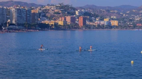 Millennials on paddleboard Stock Footage 115532913
