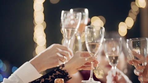 Millennials at party or holiday sitting at table, drinking champagne, eating Video stock 182046076