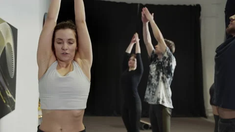 Millennials practicing healthy active lifestyle in modern loft studio Stock Footage 156238309