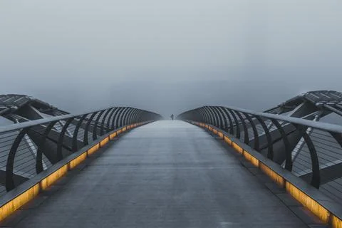 Millennium Bridge in heavy fog - selective colour Stock Photos