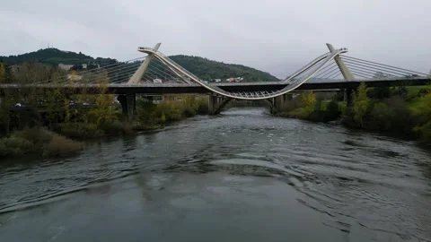 Millennium Bridge over the Miño River in Ourense, Galicia, Spain, drone Stock Footage 259616619
