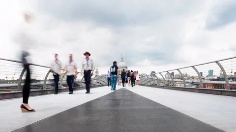 Millennium Bridge people, view of St Paul's Cathedral, London, England Stock Footage 72177003