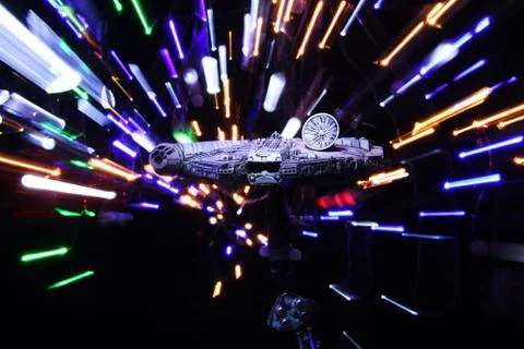Millennium Falcon jumps to hyper space warp speed light streaks Stock Illustration
