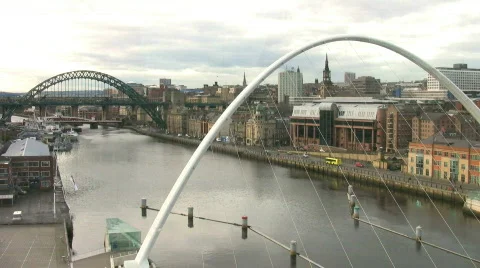 Millennium footbridge and the Tyne Bridge Newcastle upon Tyne England Stock Footage
