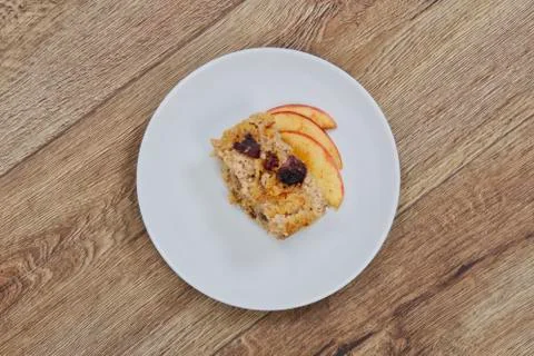 Millet pudding with apples  on a table Stock Photos