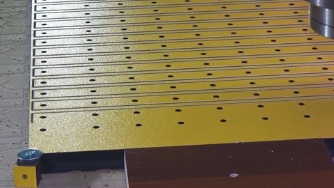 Milling cnc cuts the plastic panel by executing the cnc program. The spindle of Stock Footage 76450782