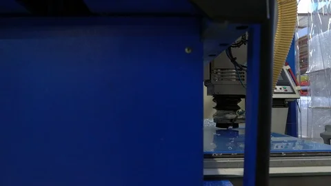 Milling cutter cuts plastic part on robotized production line Stock Footage 119398530