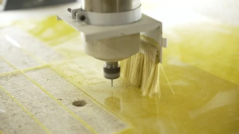 Milling cutter cuts plastic part on robotized production line. Factory robots Stock Footage 261156776