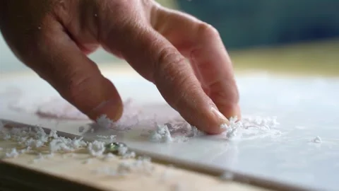 A milling machine cuts letters out of a plastic sheet. Stock Footage 286972394
