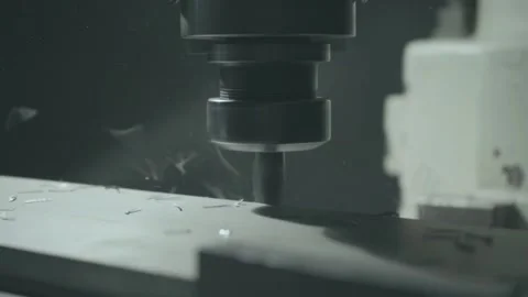 A milling machine cuts metal and flies chips Stock Footage 133138968