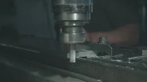 A milling machine cuts metal and flies chips Stock Footage 133139027