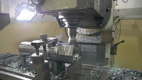 Milling machine cuts metal making part. Process of metalworking. Video stock 129102892